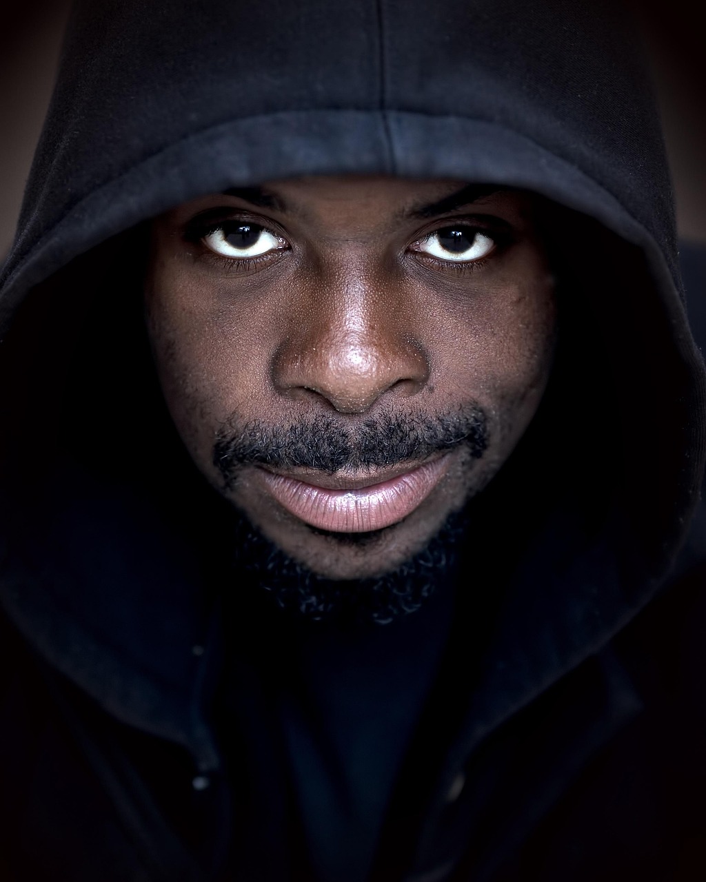 about-us-01 people, hoodie, male, person, man, young, portrait, one, lifestyle, adult, black, dark, urban, guy, fashion, hood, attractive, human, casual, model, hooded, confident, men, style, shirt, expression, black city, black fashion, black model, black portrait, black dark, black human, men, men, men, men, men